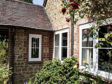 Mold North Wales : First Installation of our new Evolution Storm White wood PvcU Timber look a like window and oor range . 